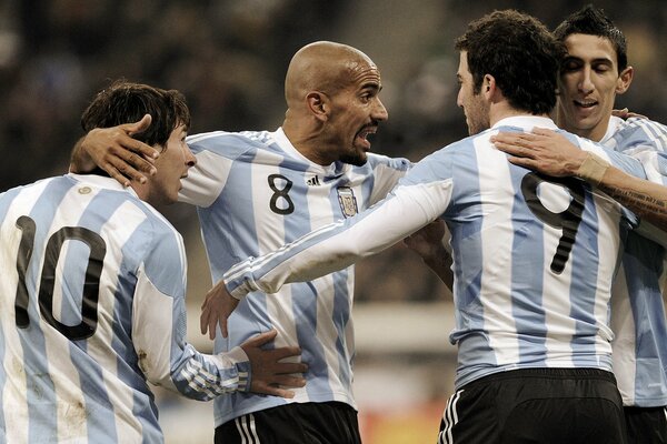 Argentina s footballers rejoice for scoring a goal