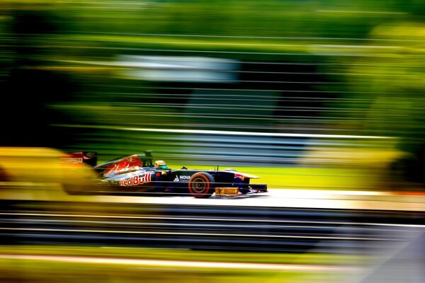 The car. Formula F1. Blurred background. Speed