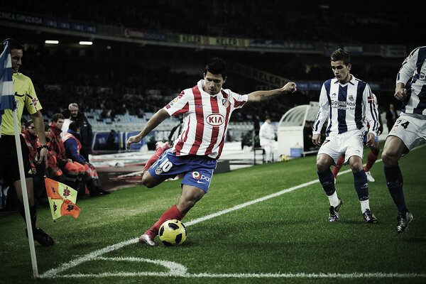 Madrid players lead the ball across the field