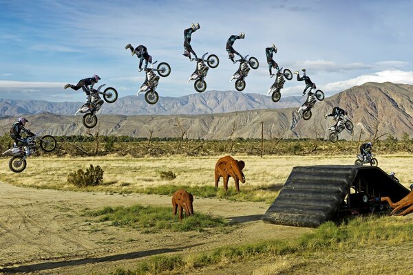 Motorcyclists make jumps to nature