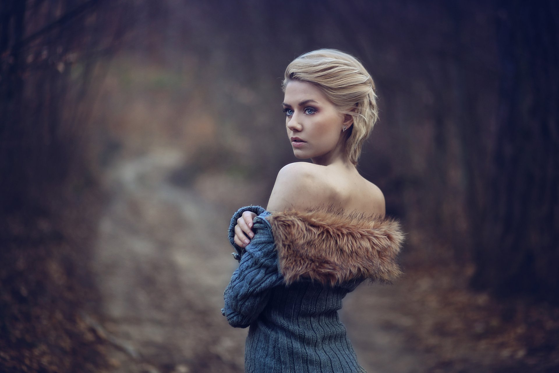 girl blonde jacket fur shoulders forest road autumn mood bokeh