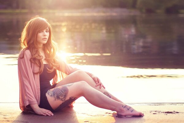 Girl with tattooed legs