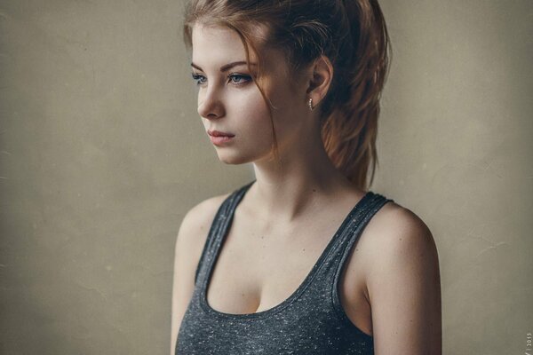 Beautiful girl posing with a thoughtful look