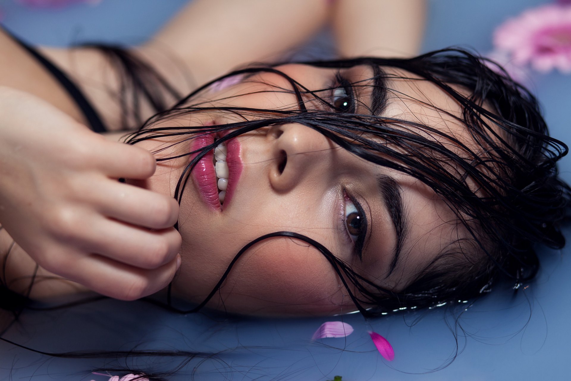 portrait face eyes shine lips strands hair wet petals water