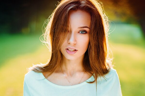 Beautiful girl posing at sunset