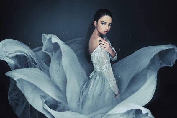 Brunette in a luxurious fantasy dress