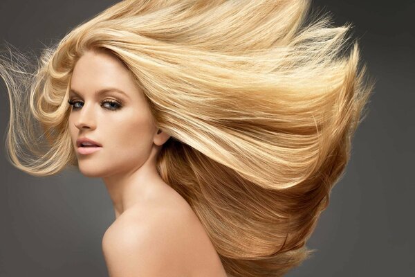 Blonde with long hair fluttering in the wind