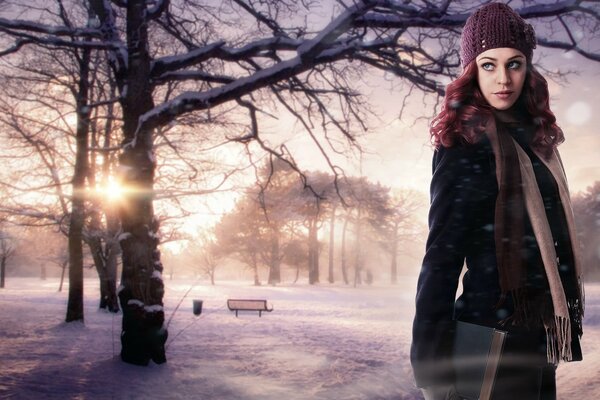 Bella ragazza su sfondo invernale