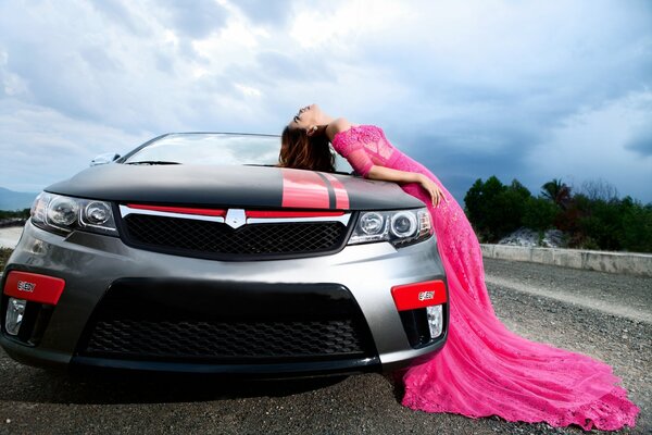 Asian girl and a gorgeous car