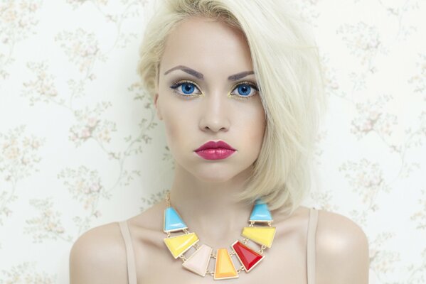 Blonde girl with colorful beads