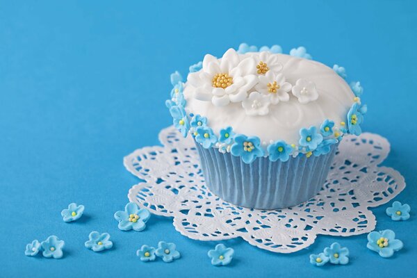 Beautifully decorated white sweet cupcake