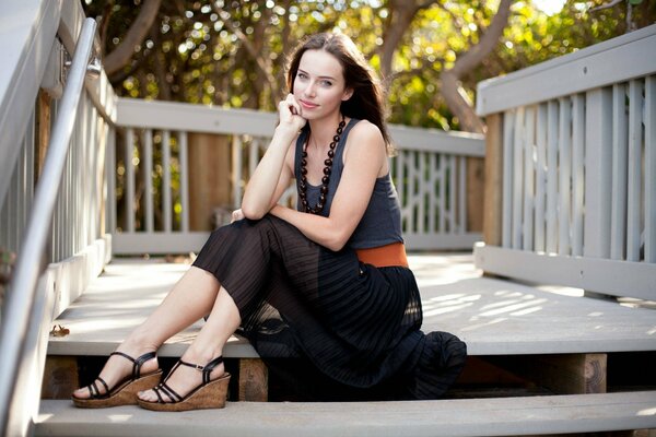 Model Megan Coffey on the porch