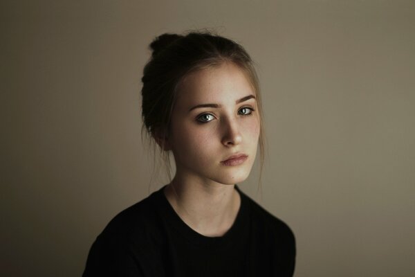 Self-portrait of a lovely girl with freckles