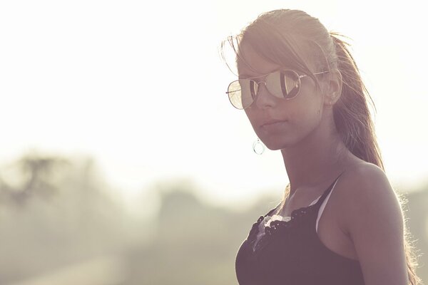 Girls with glasses in unusual lighting