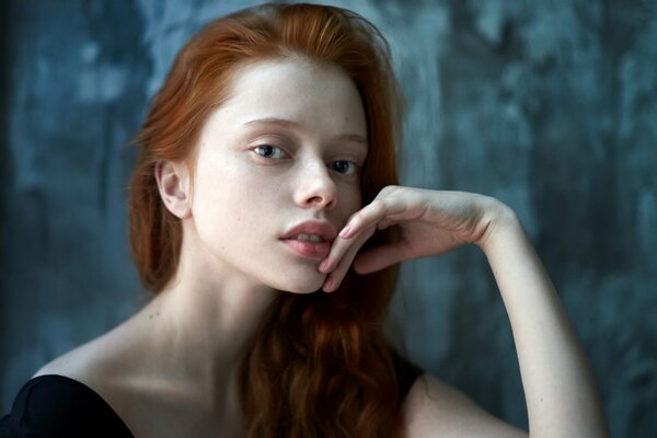 Red-haired Ekaterina Yasnogorodskaya poses for a photo