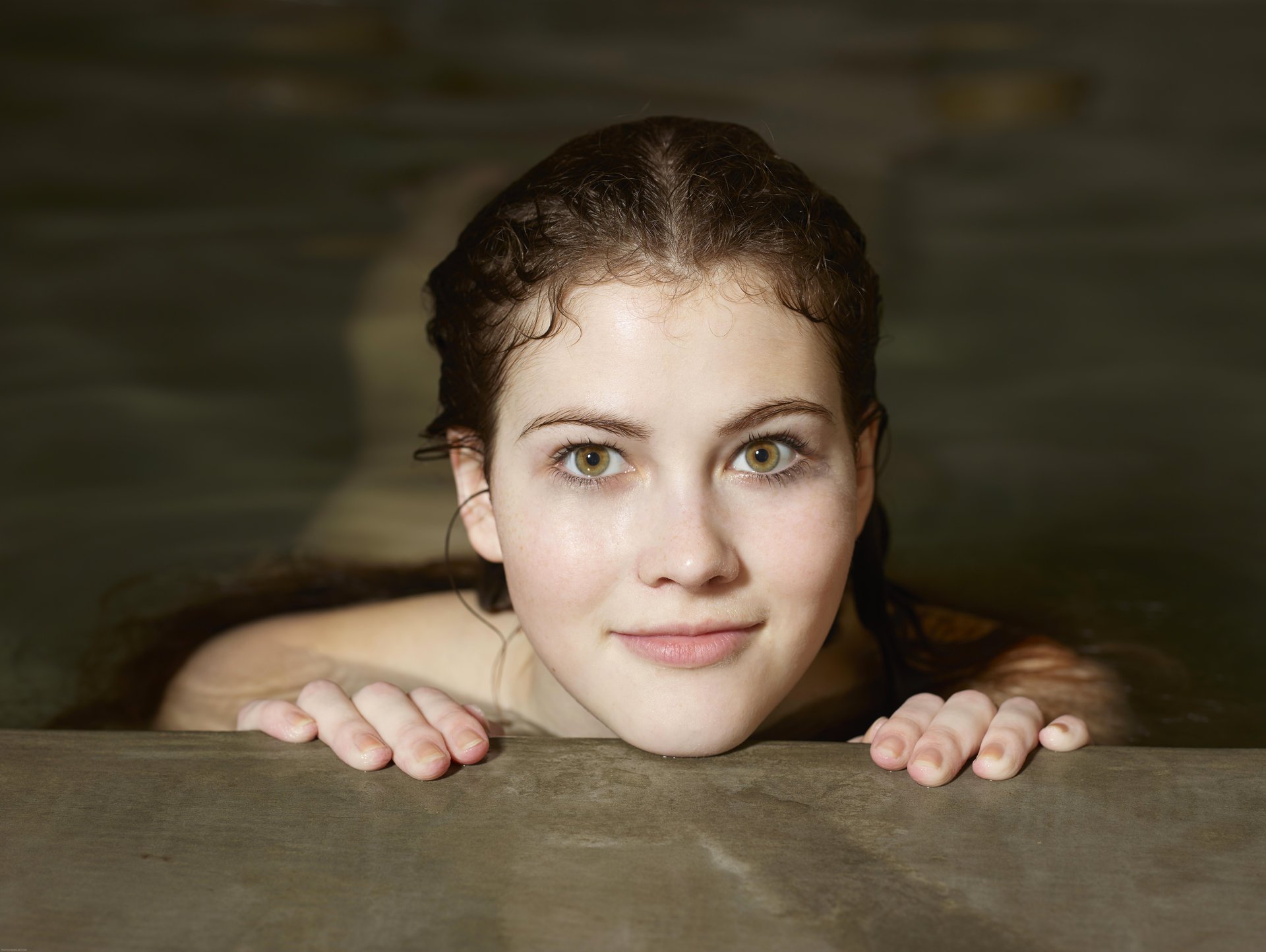 girl green-eyed brown hair view water smile