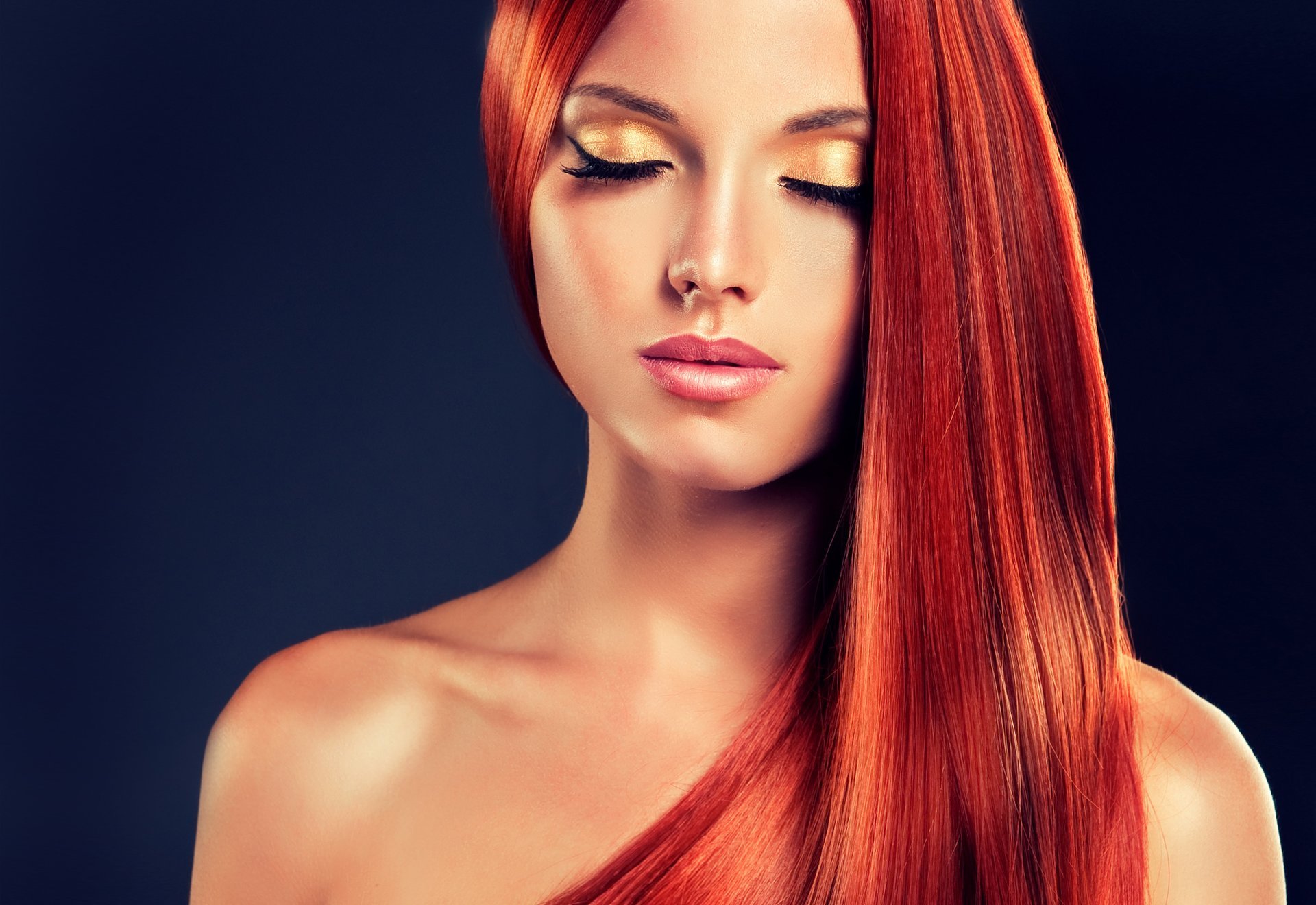 girl beautiful . model red hair make-up eyes closed