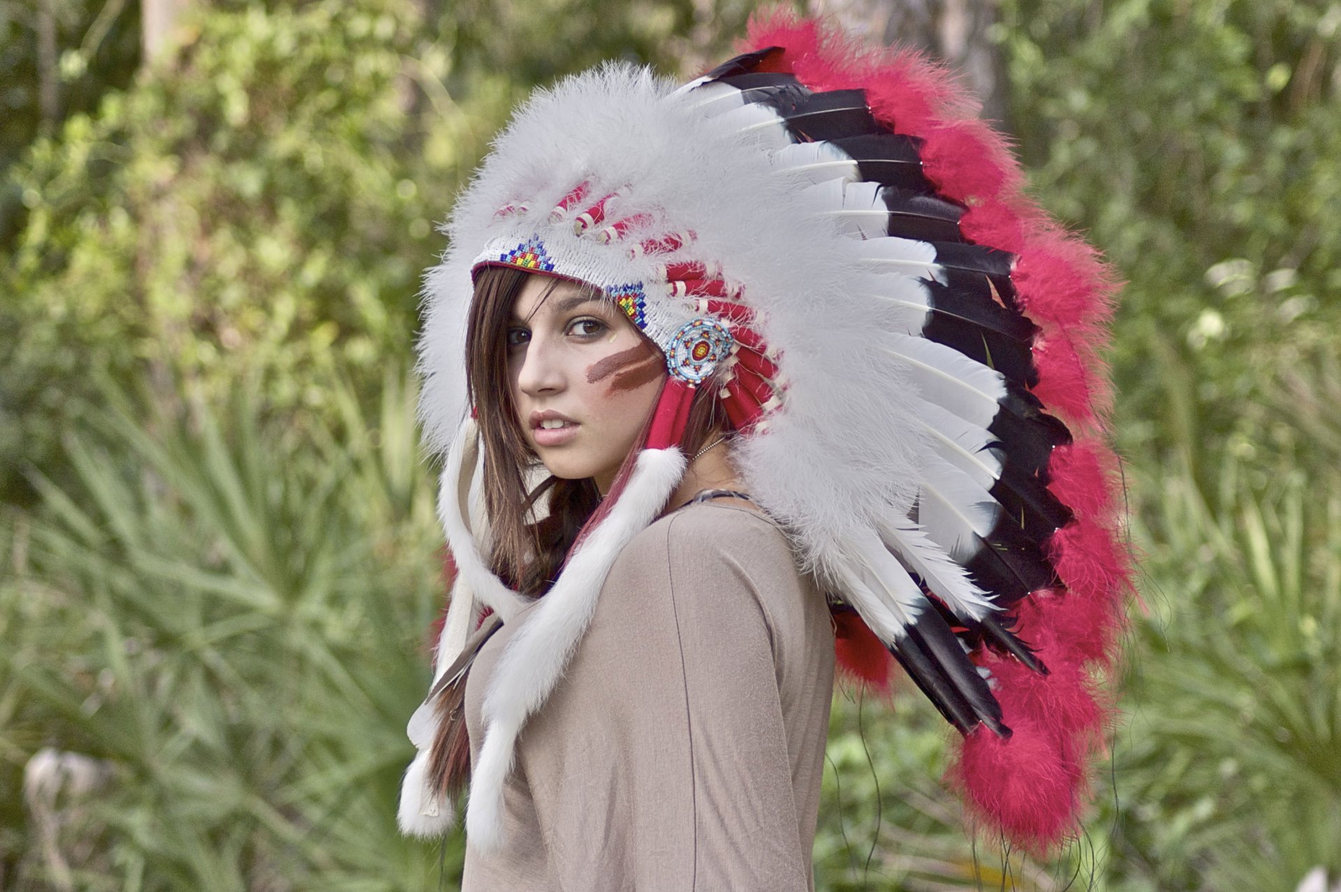 girl view feathers headwear blur