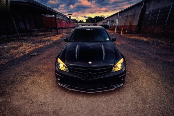 Black mercedes on a beautiful sky background