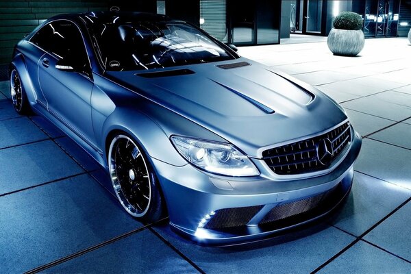 Blue Mercedes at night
