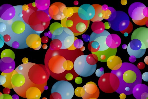 Multicolored balls of different sizes on a black background