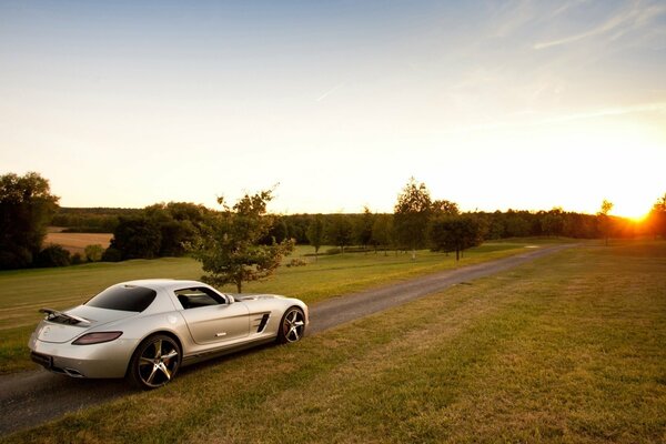 Beautiful car on the background of sunset