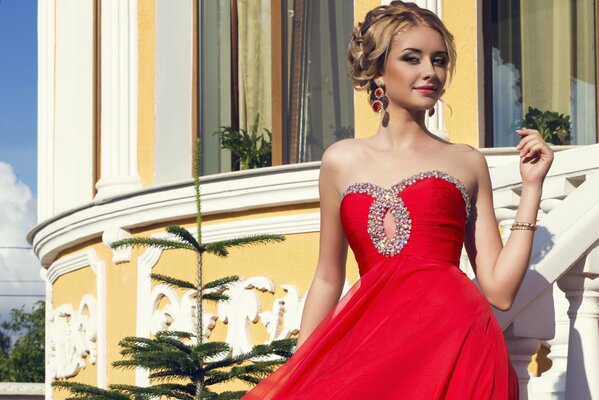 Blonde in a red dress with jewelry