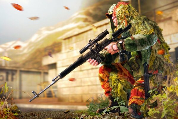 A sniper with a rifle disguised as an autumn bush