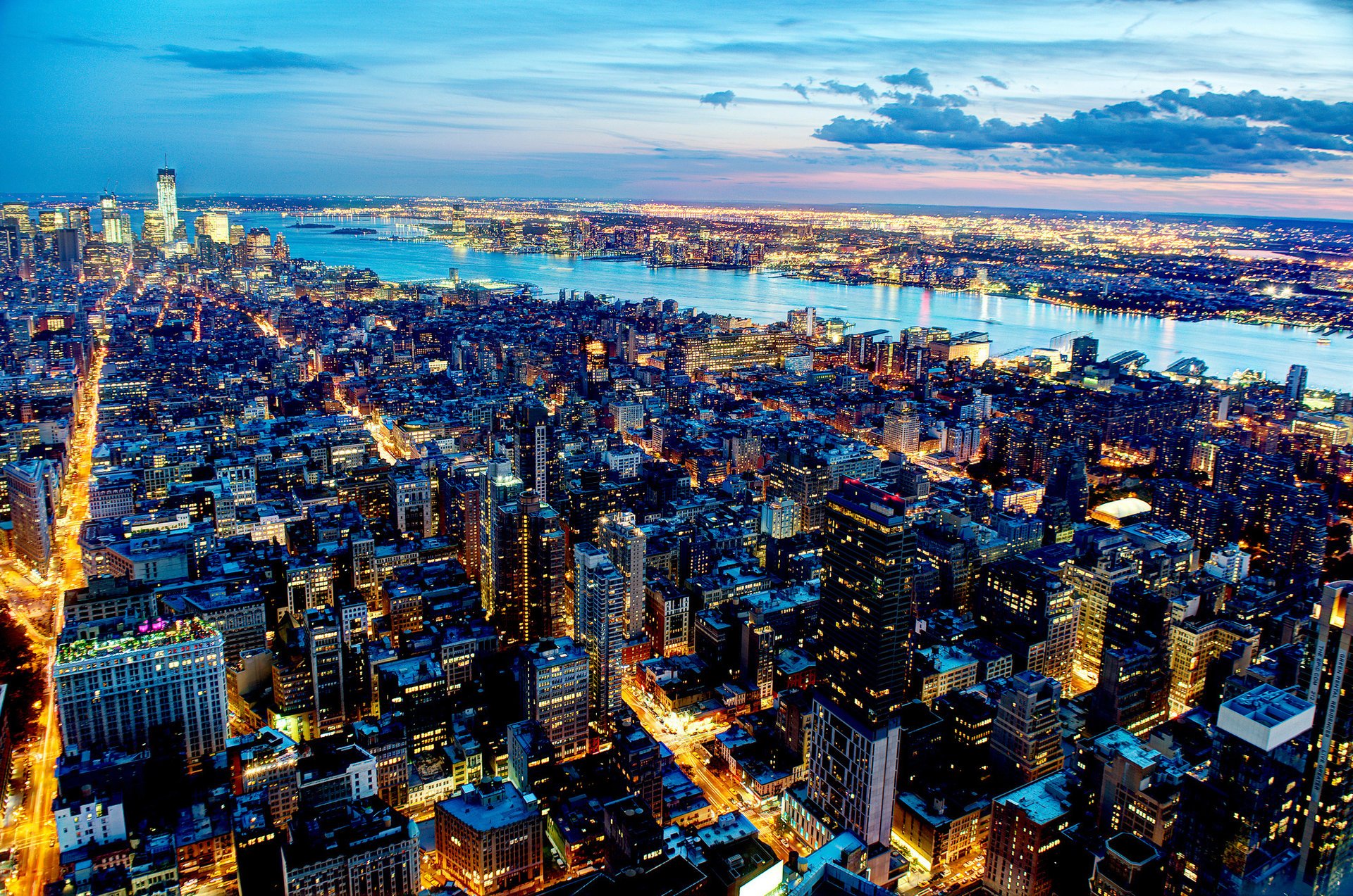 nueva york noche rascacielos río luces ciudad