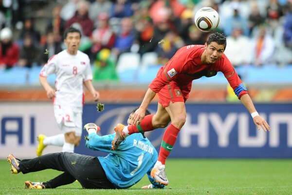 Real Madrid soccer player Ronaldo hits the ball with his head