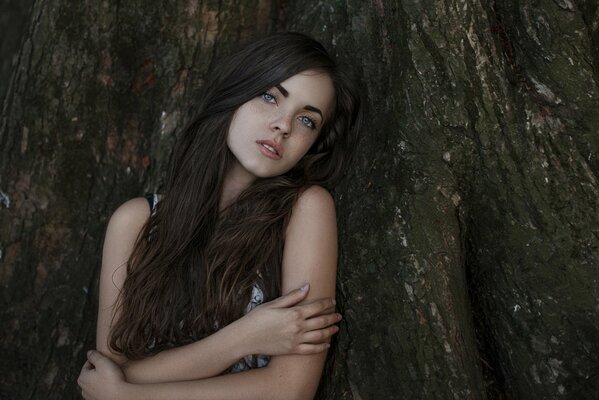 Beautiful girl walking in the woods