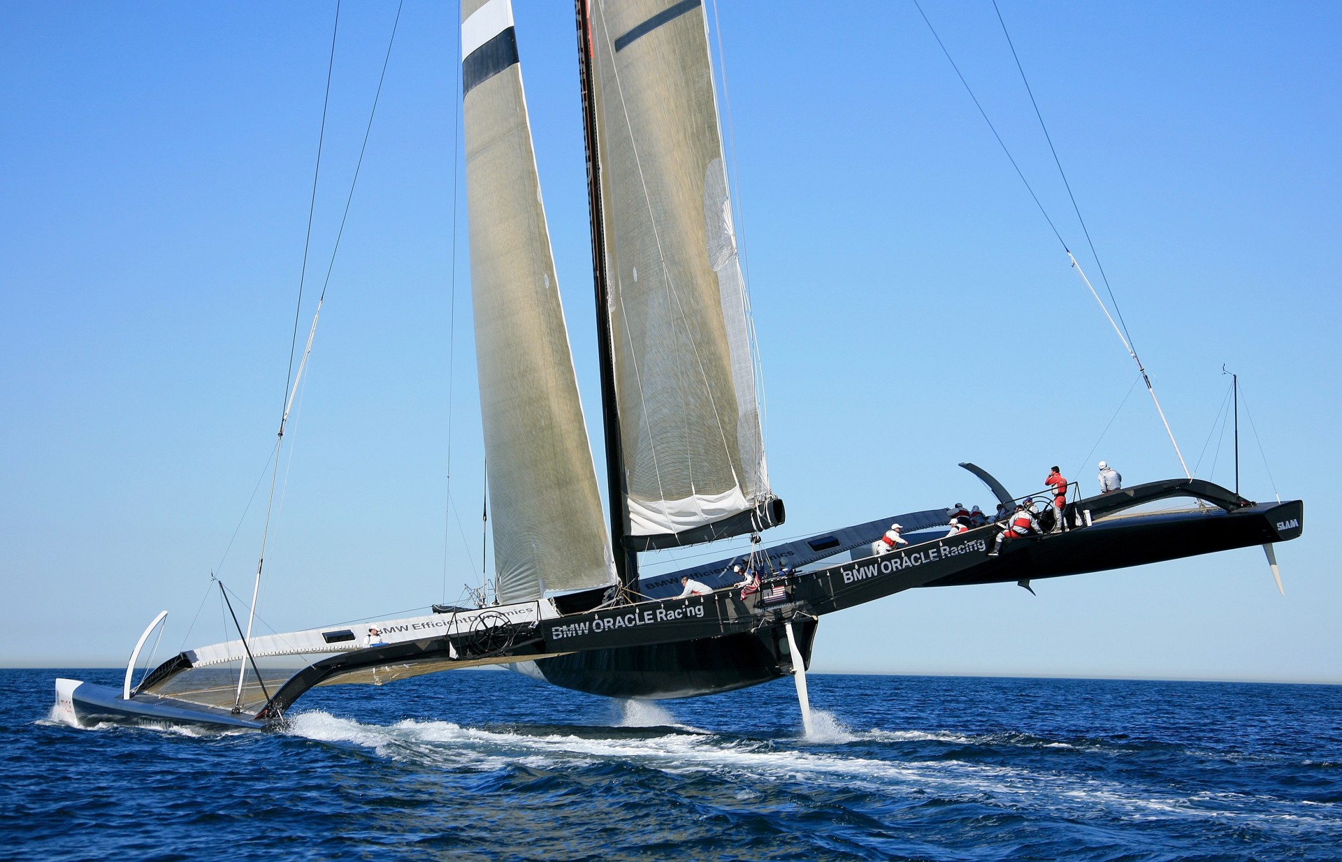 ail black team ship butterfly ocean trimaran sky sea blue horizon catamaran