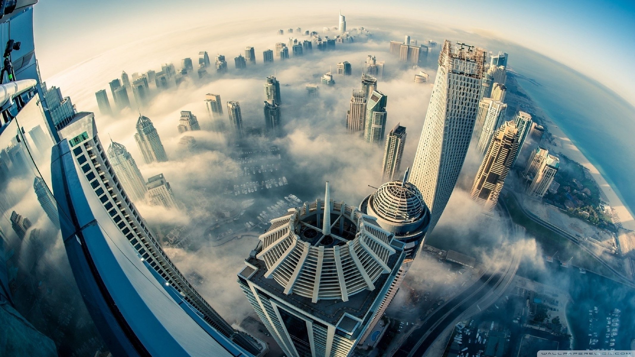 dubai skyscrapers height clouds horizon