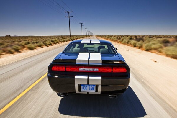 Car at speed on the highway