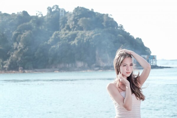 Portrait of a girl on the background of hills