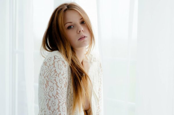 Portrait of a beautiful girl with long hair