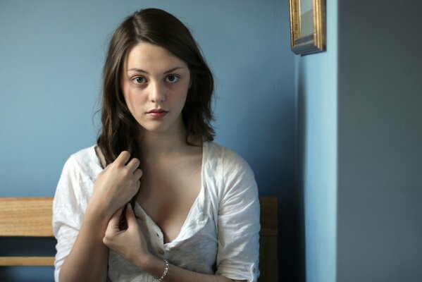 Charming look of a girl with brown hair