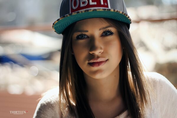 Photo of a girl in a blue cap