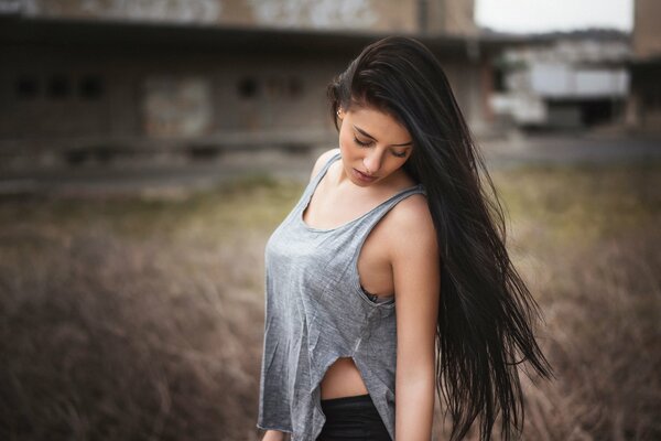 Gentle and cold girl with long hair
