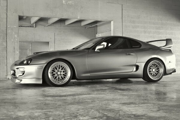The gray tuning of the Toyota Supra is perfect