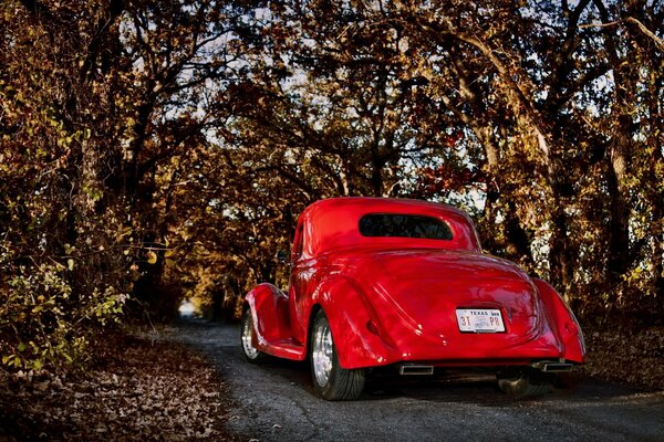 Classic retro car driving on the road