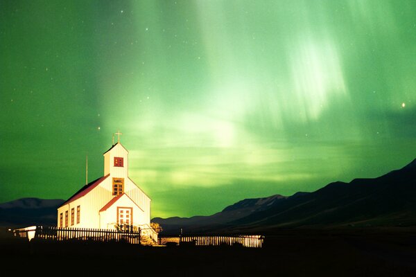 Northern Lights night chapel green house fence