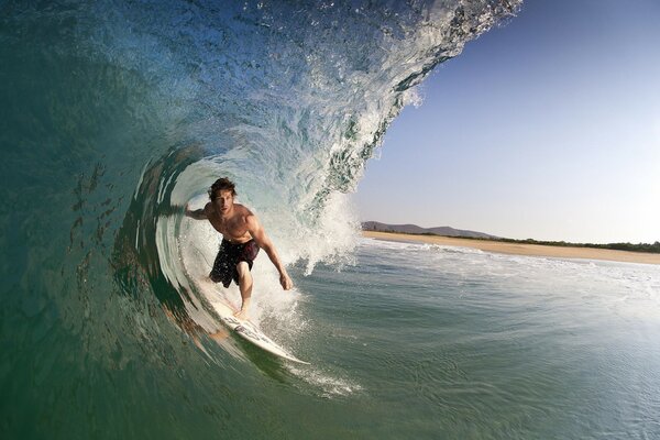 Surfing in Mexico on a big wave