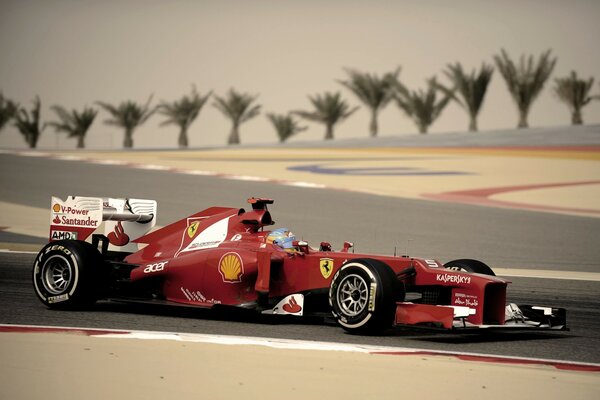 Alonso racing a Ferrari in Formula