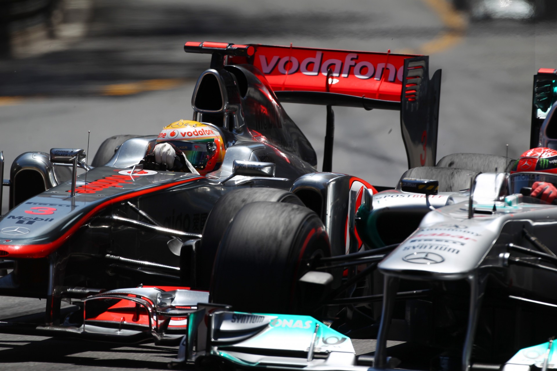 mclaren rotation lewis hamilton michael schumacher pilot monaco formula 1 track rider mercedes f1 overtaking curb 2011