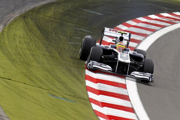 Racing car on a turn on the track