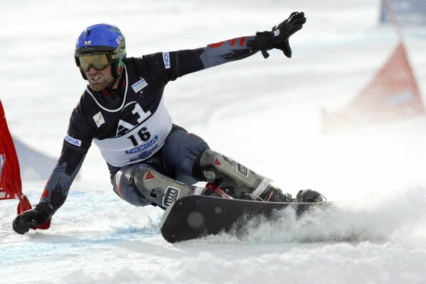 Snowboard athlete on white snow