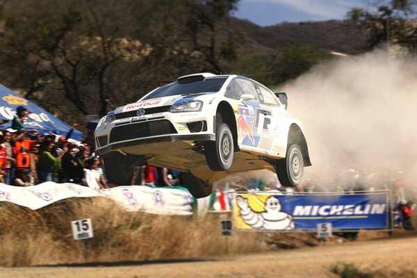 A car in flight at a car race