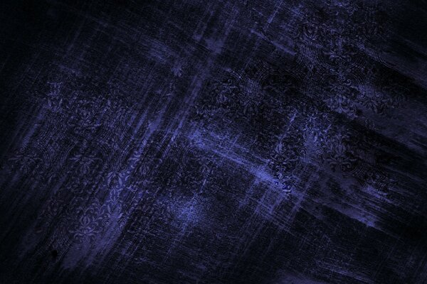 Texture with scuffs on a purple background