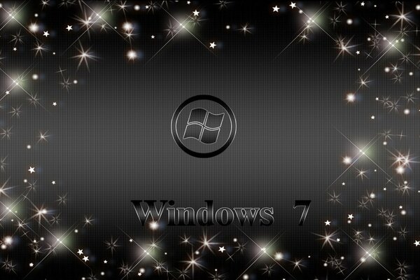 The inscription Windows seven on a black background with sequins